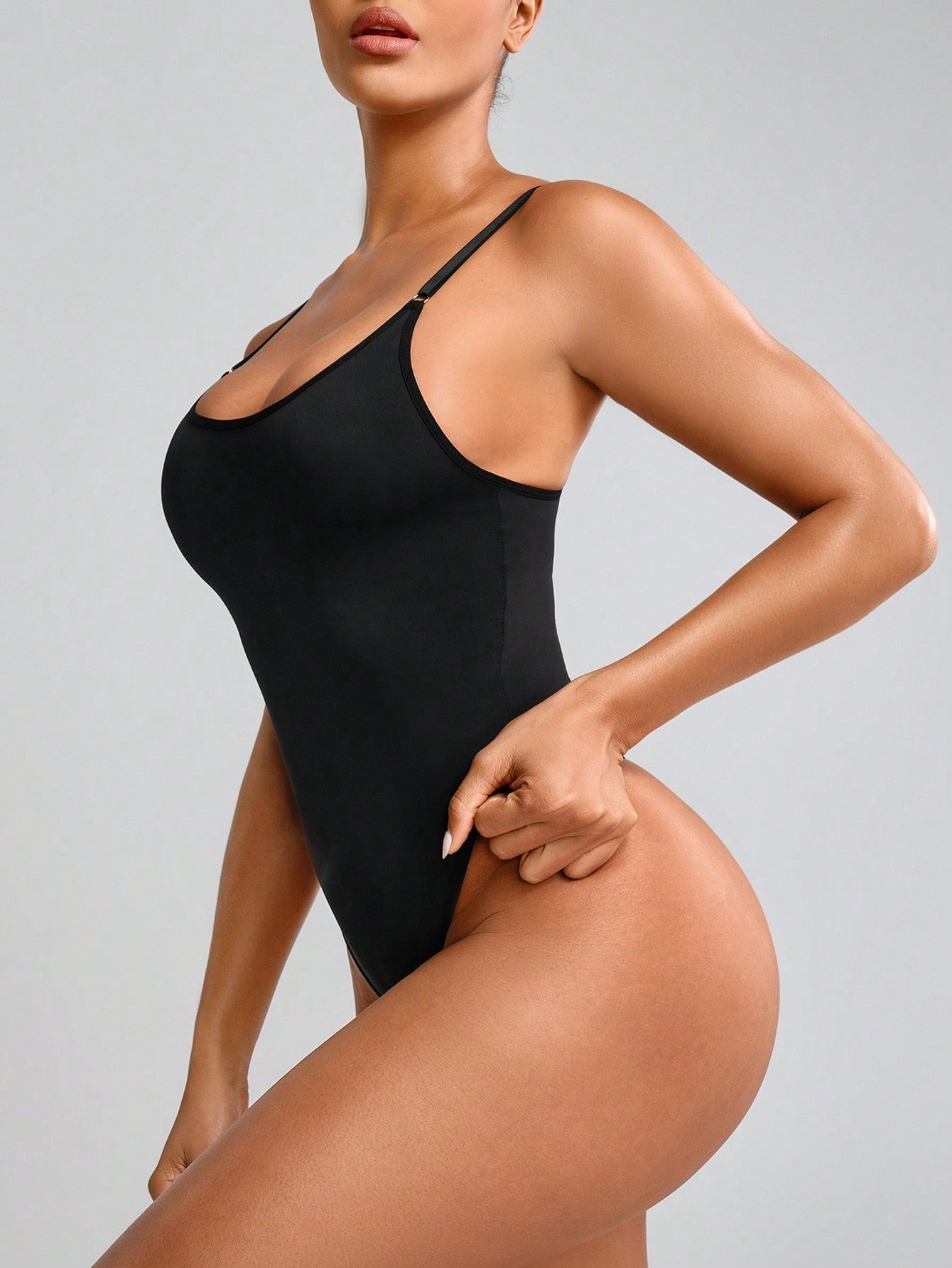 One-piece thong body shaper .waist and hip lifting body shaper